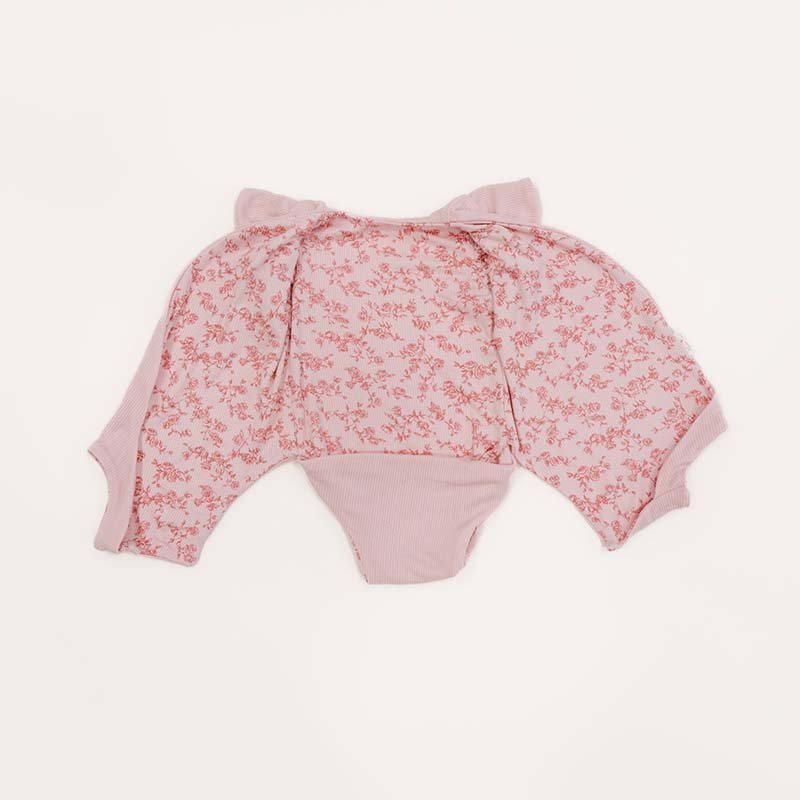Bitty Pink Blooms design flutter sleeve winged bodysuit in silky modal fabric.