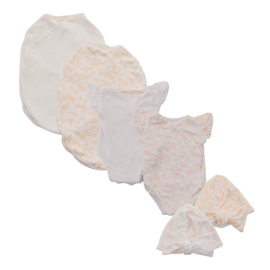 Newborn essentials bundle with flutter sleeves in silky modal fabric with bitty blooms design.