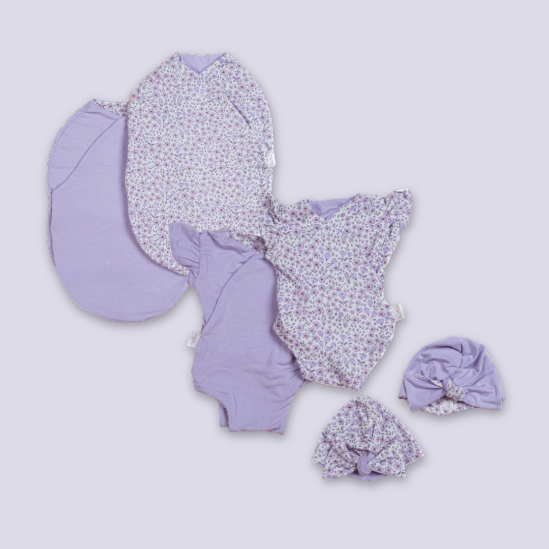 Newborn essentials bundle with flutter sleeves in silky modal fabric with purple posies design.