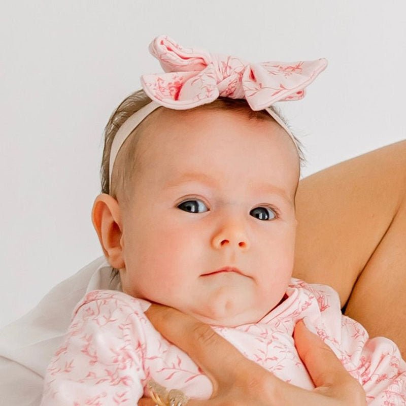 Bamboo cotton baby headband & bow set in whimsical garden design.