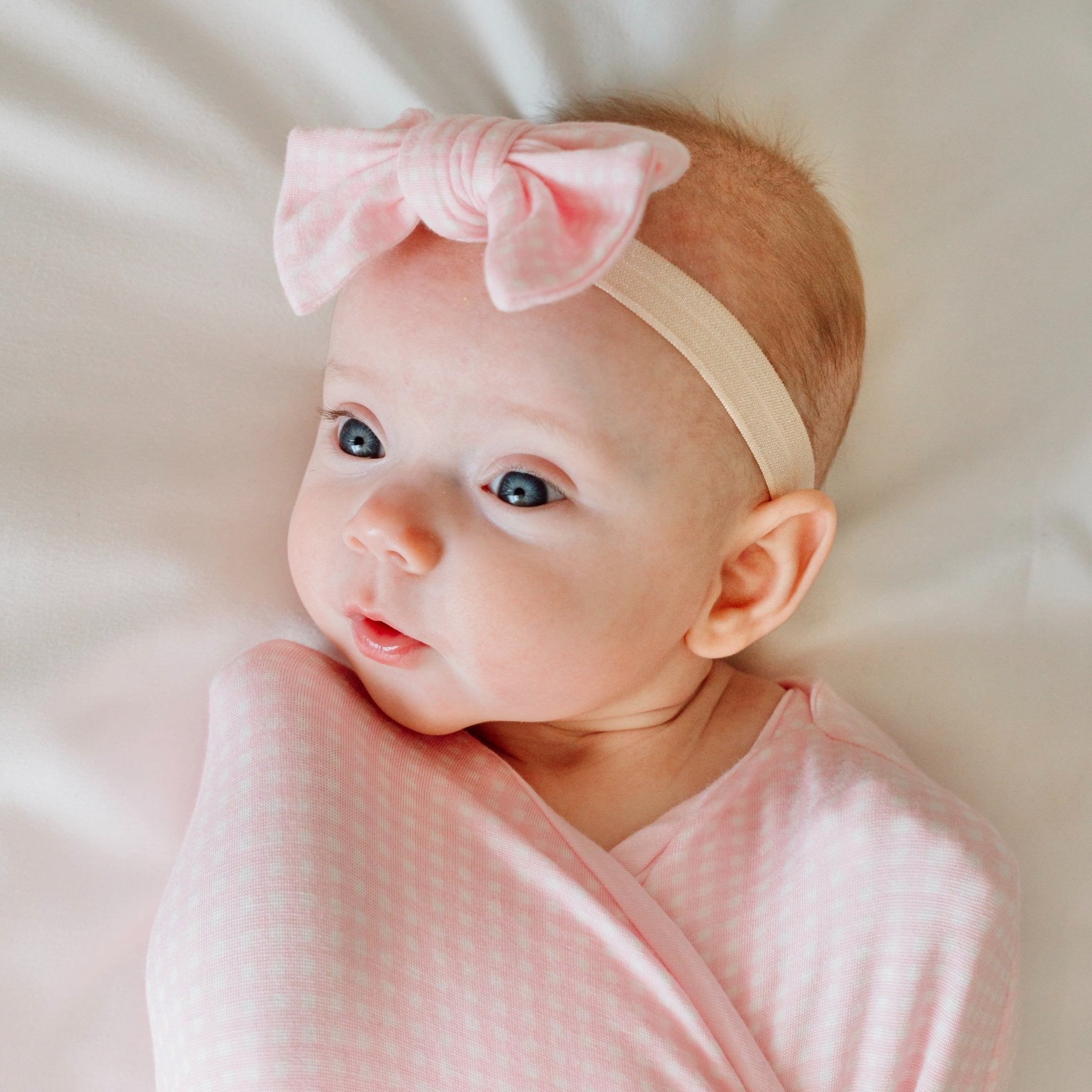 Headband and bow set in Baby Pink Gingham design, made from silky modal fabric.