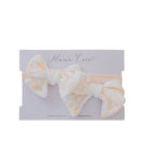 Headband and bow set in Bitty Blooms design, made from silky modal fabric.