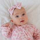 Adorable headband and bow sets available in luxurious silky modal with Bitty Pink Blooms design.