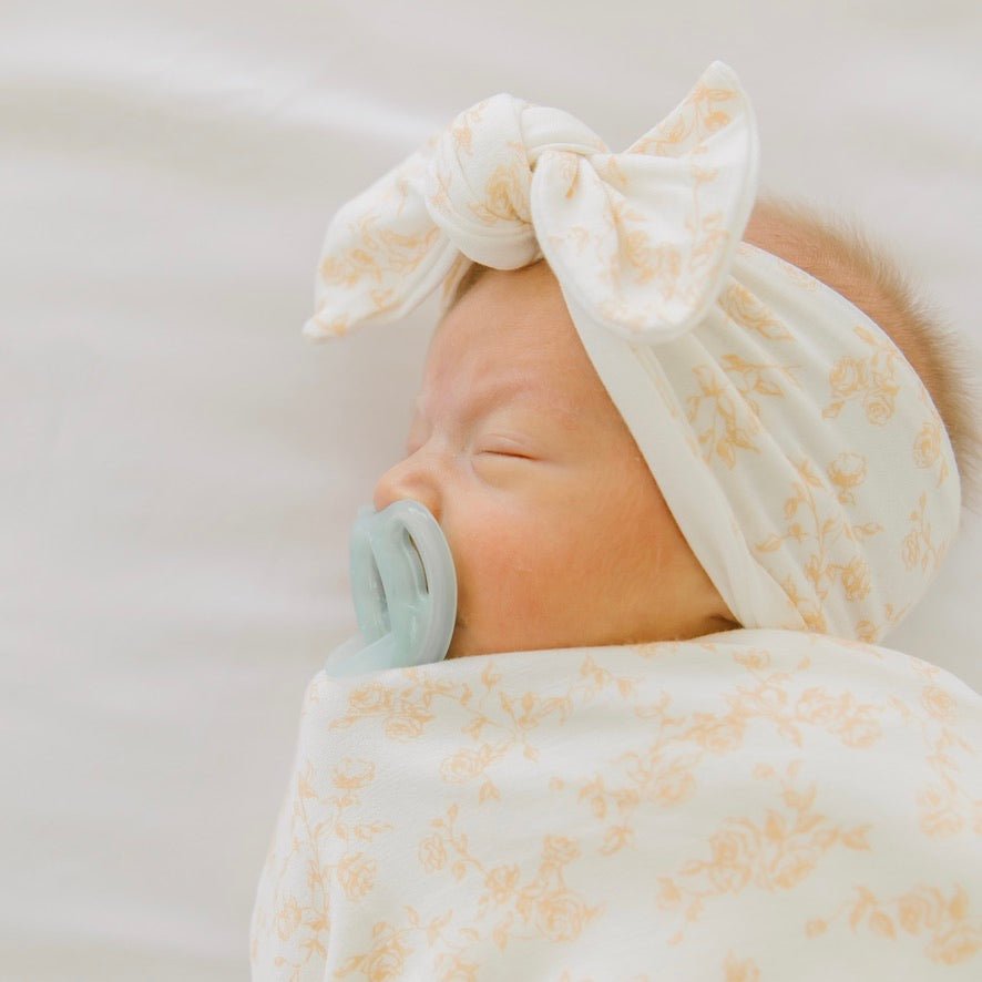 Headwrap with bow in Bitty Blooms design, made from silky modal fabric.