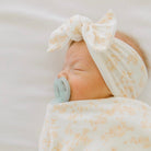 Headwrap with bow in Bitty Blooms design, made from silky modal fabric.