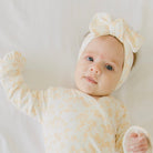 Adorable bow headwrap available in luxurious silky modal with Bitty Blooms design.