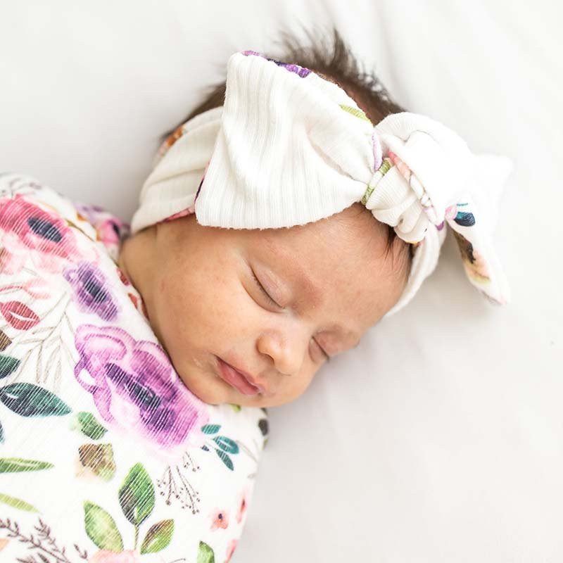 Ivory Wildflowers headwrap for babies, featuring a stylish bow detail.
