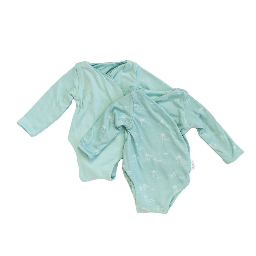Honeydew palms design long-sleeve baby onesie in classic brushed fabric.