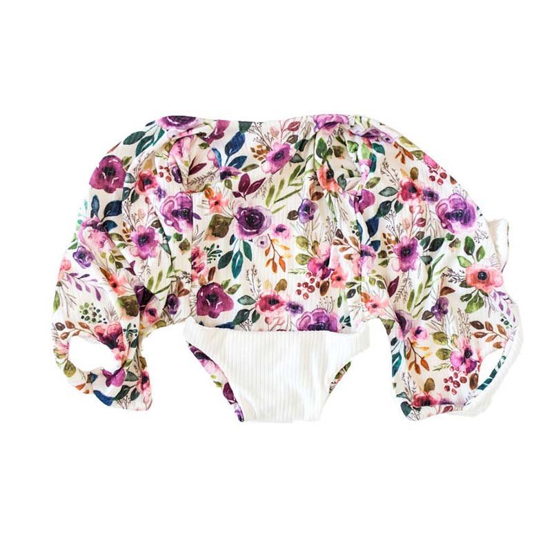 Comfortable Ivory Wildflowers design brushed fabric baby bodysuit with wings and ruffle trim cuffs.