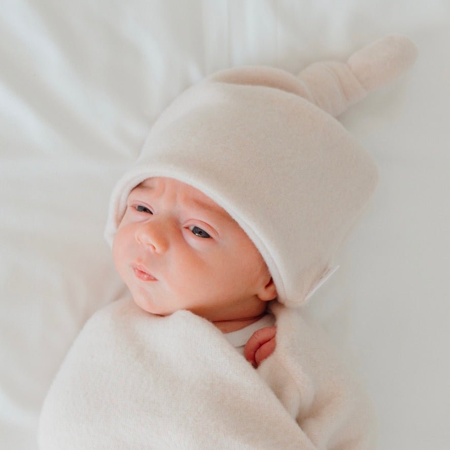 Knotty beanie in Plush Latte design, made from Plush Dream fabric.