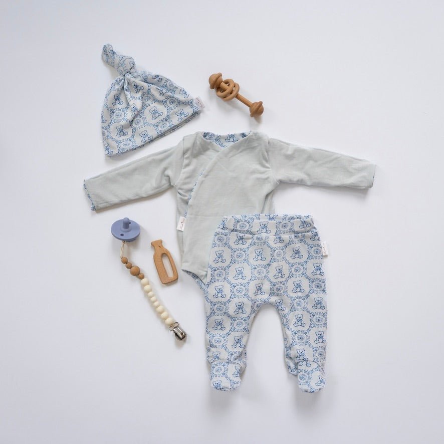 Long-sleeve baby onesie outfit bundle made from bamboo cotton in teddy tiles design.