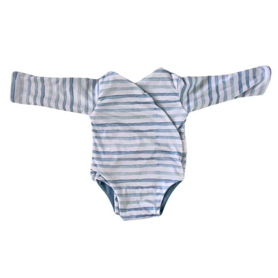 Long-sleeve winged bodysuit in chambray waves design.