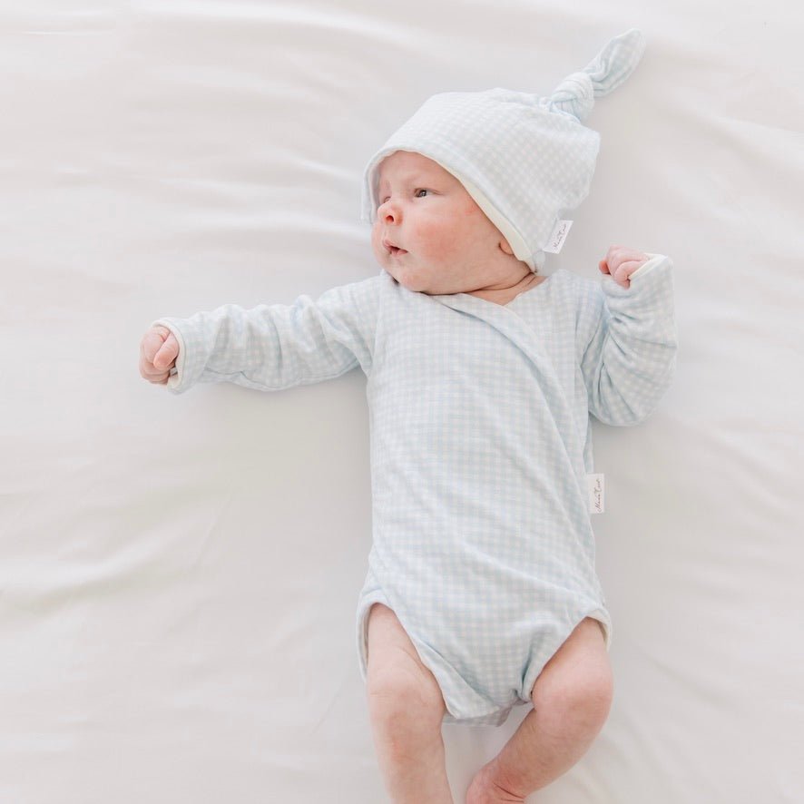 Long-sleeve onesie outfit bundle in baby blue gingham design.