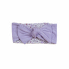 Sweet headwrap with bow, made from ultra-soft Purple Posies fabric.