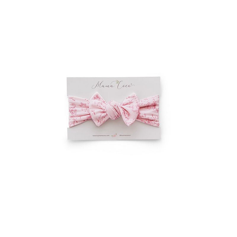 Our bamboo cotton baby headwrap in whimsical garden design.