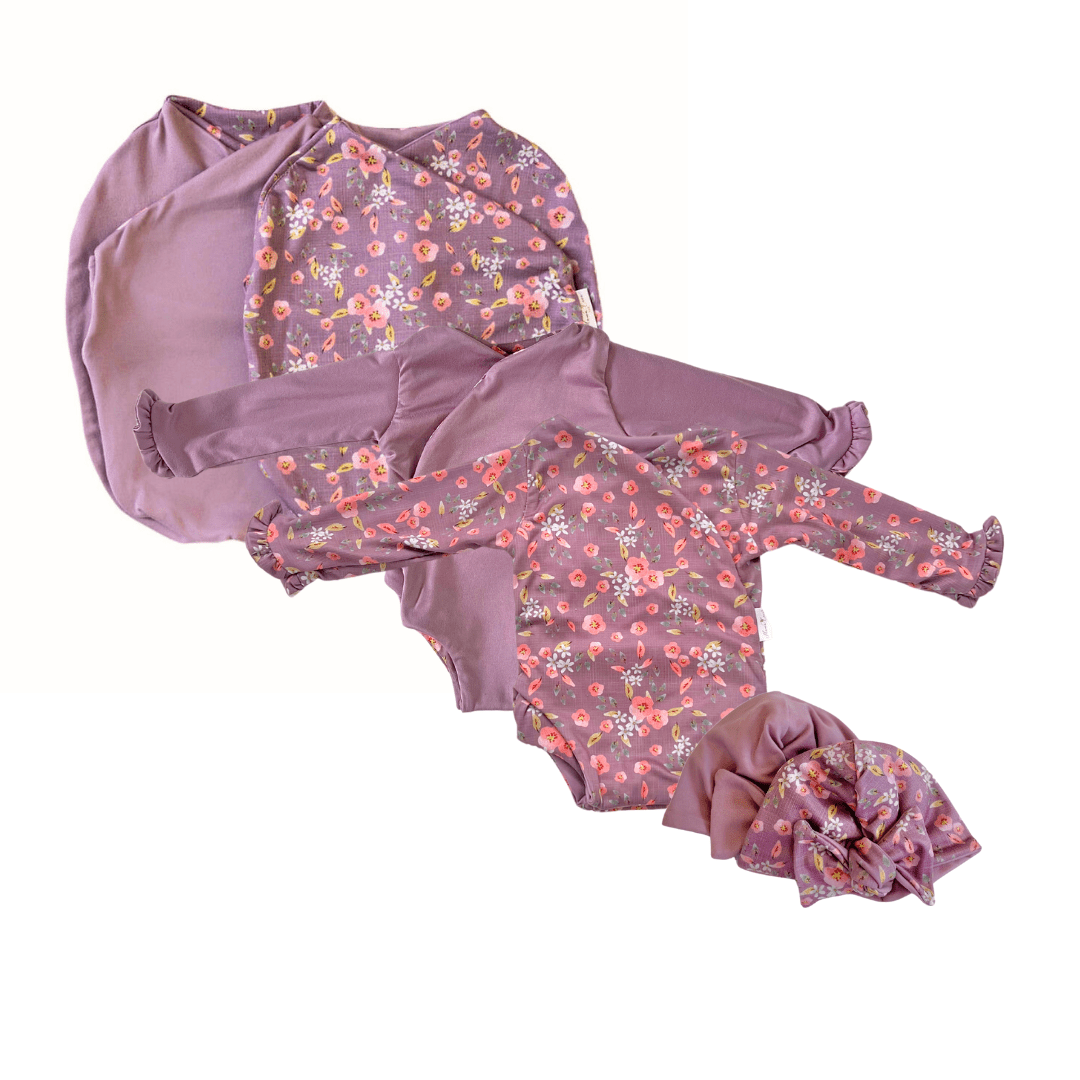 Classic brushed long sleeve newborn baby bundle, featuring adorable ruffle cuffs in peachy lilac design.