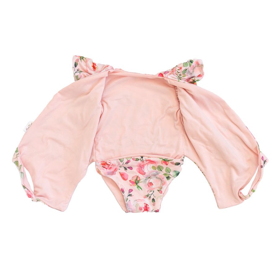 Reversible floral baby bodysuit featuring Peachy Rose Fields in premium brushed fabric.