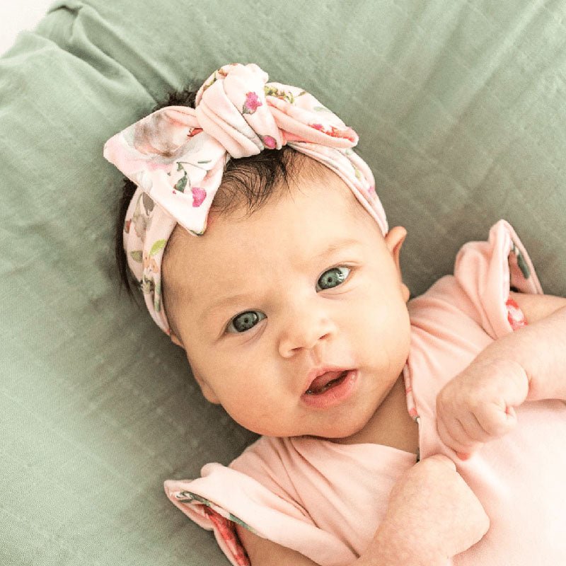 Peachy Rose Fields headwrap for babies, featuring a stylish bow detail.