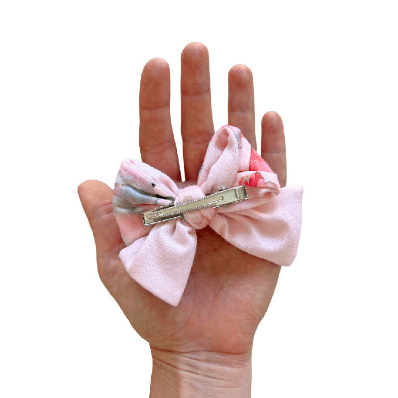 Peachy Rose Fields infant headband with bow and coordinating bow hair clip.