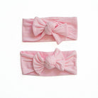 Sweet headwraps with bow, made from ultra-soft Baby Pink Gingham fabric.