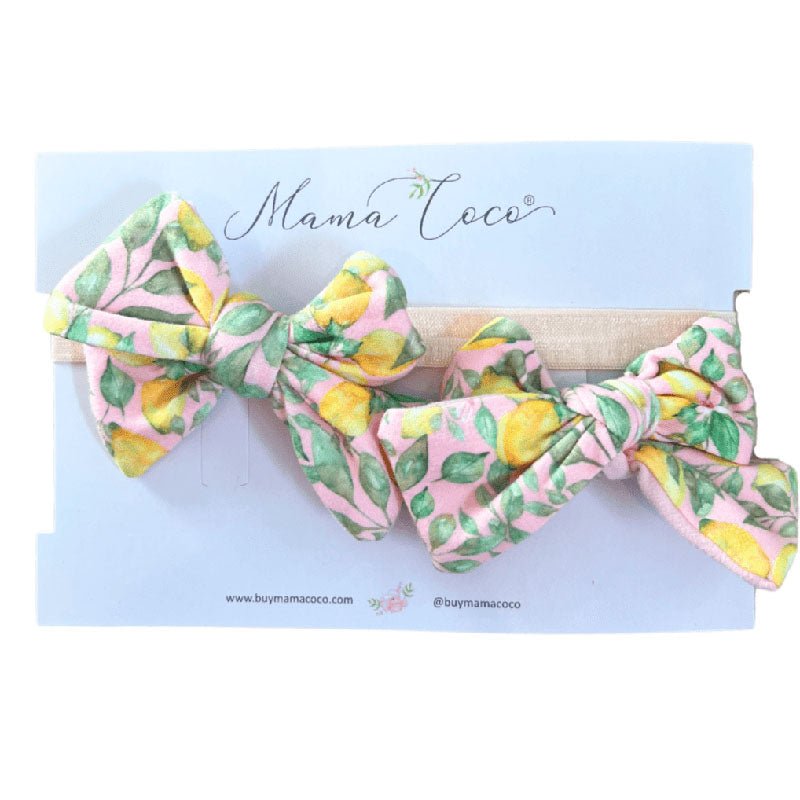 Baby headband with bow and matching bow clip in Pink Lemonade Classic Brushed fabric.