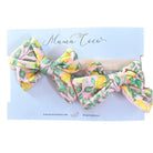 Baby headband with bow and matching bow clip in Pink Lemonade Classic Brushed fabric.