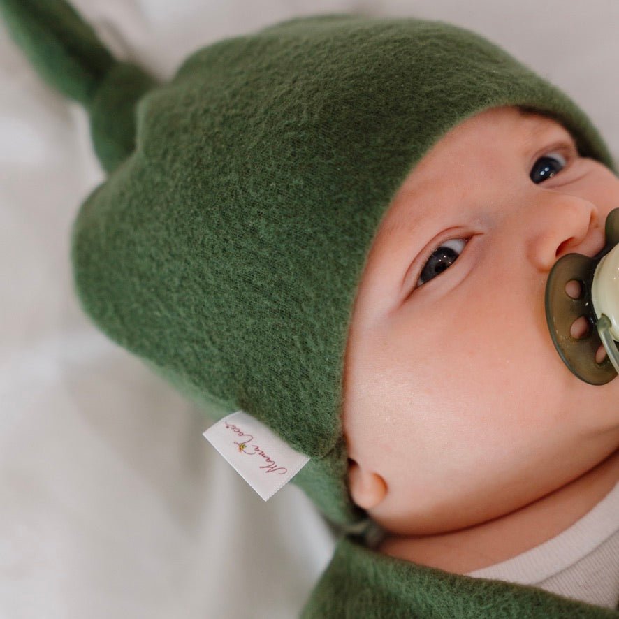 Adorable knotty beanie available in luxurious Plush Juniper Pine fabric.
