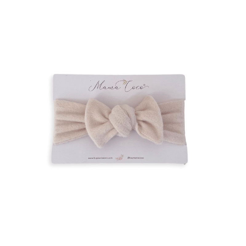 Headwrap with bow for baby in Plush Latte fabric styles.