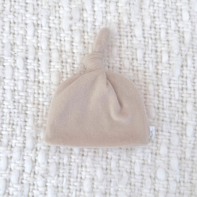 Adorable knotty beanie available in luxurious Plush Latte fabric.