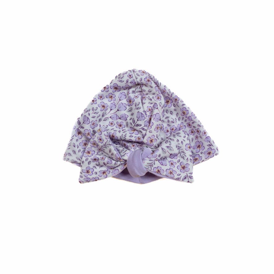 Purple posies design reversible baby knotty beanie in silky modal fabric.