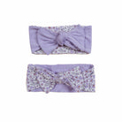 Adorable bow headwraps available in luxurious silky modal with Purple Posies design.