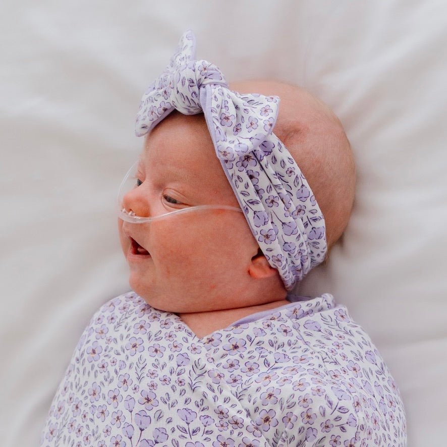 Headwrap with bow crafted in soft Purple Posies design silky modal fabric.