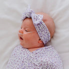Headwrap with bow crafted in soft Purple Posies design silky modal fabric.