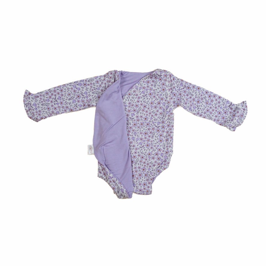 Reversible purple posies design baby onesie outfit in silky modal fabric.