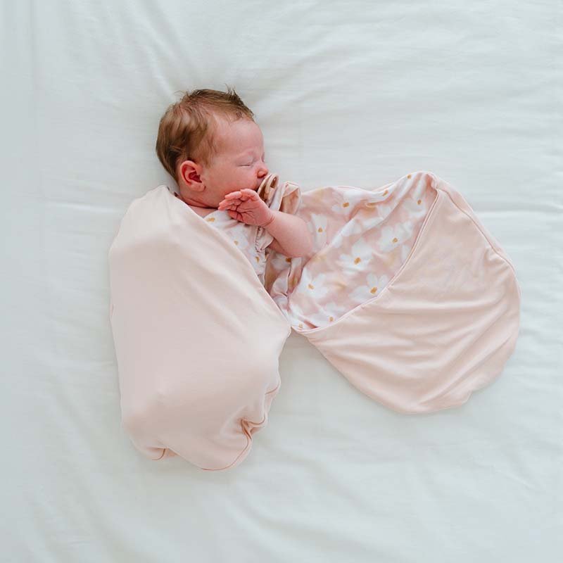 Reversible Silky Modal baby cocoon swaddle with classic Sweet Lily print.
