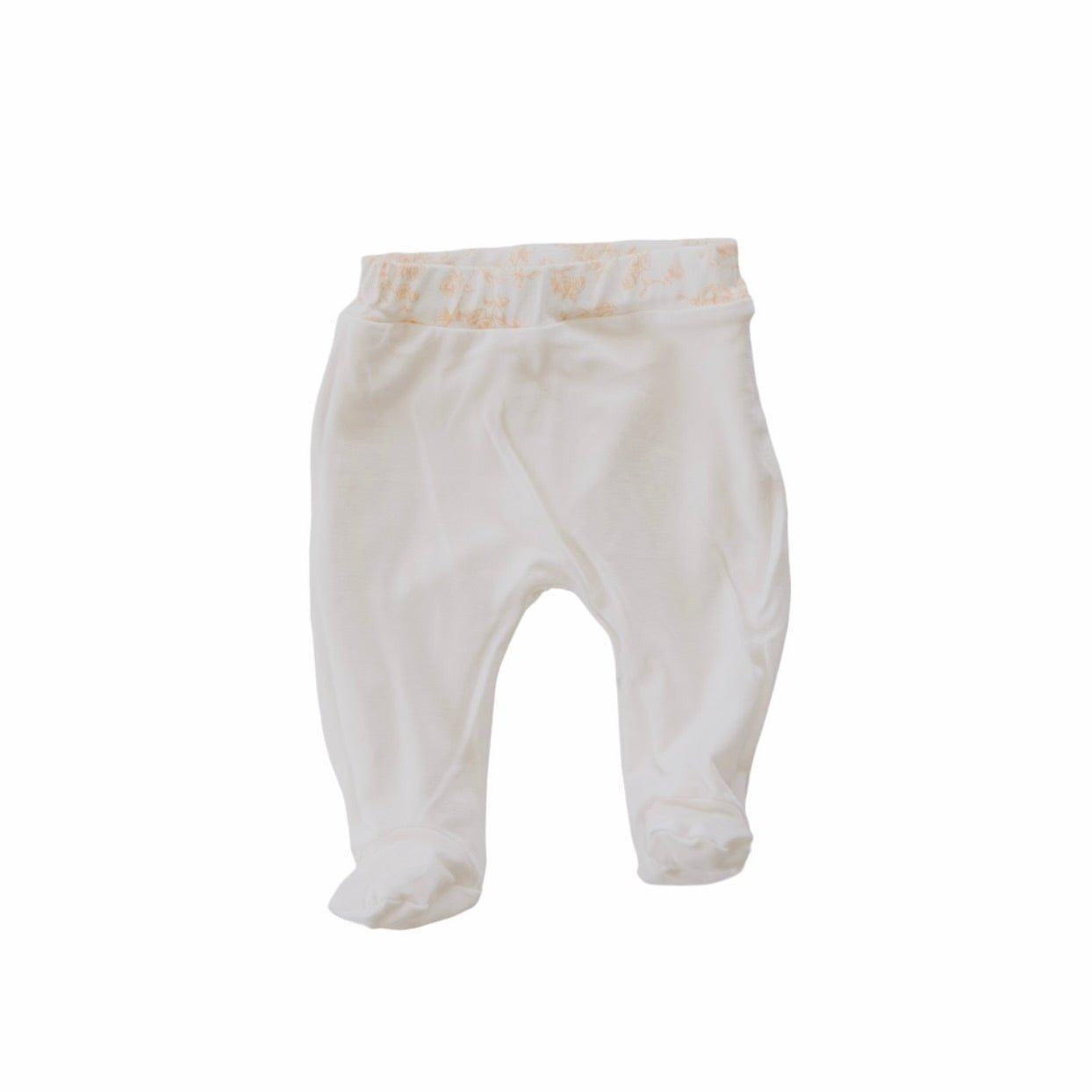 Reversible baby footie pants designed in silky modal fabric featuring our Bitty Blooms design.