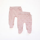 Reversible baby footie pants in dainty dots design.