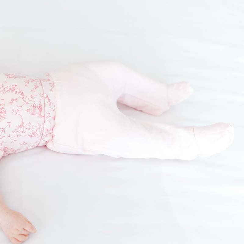 Ultra-soft bamboo cotton baby footie pants in our adorable whimsical garden design.