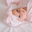 Reversible baby knotty beanie in dainty dots design.