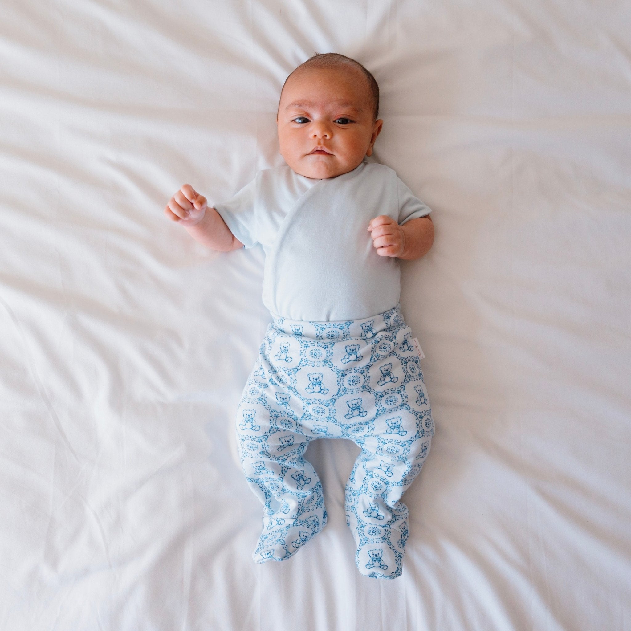 Reversible short-sleeve baby onesie outfit bundle in teddy tiles design.