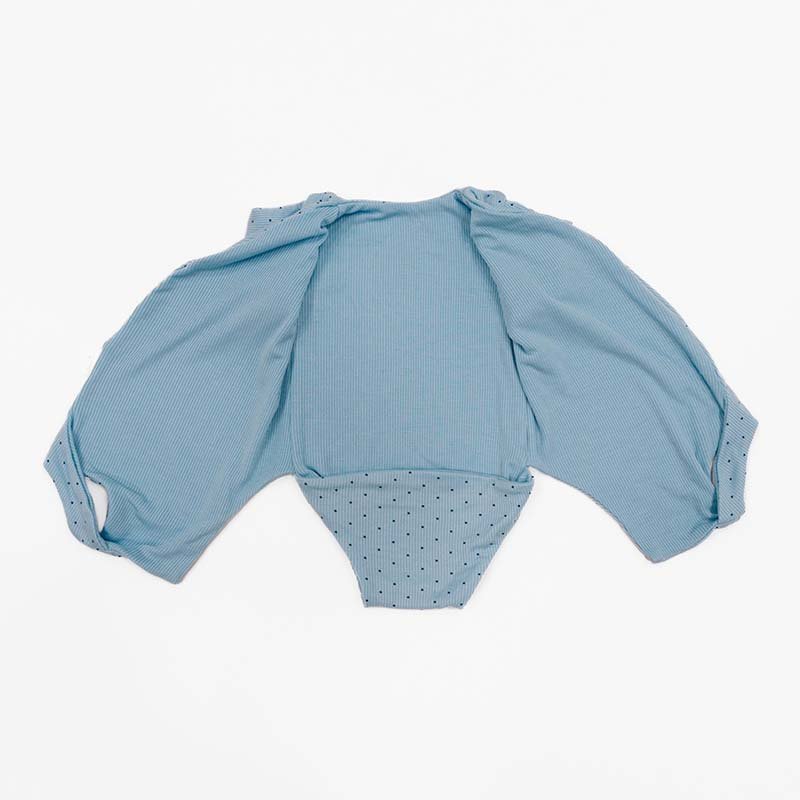 Reversible Dotted Blues design short sleeved winged bodysuit in silky modal fabric.