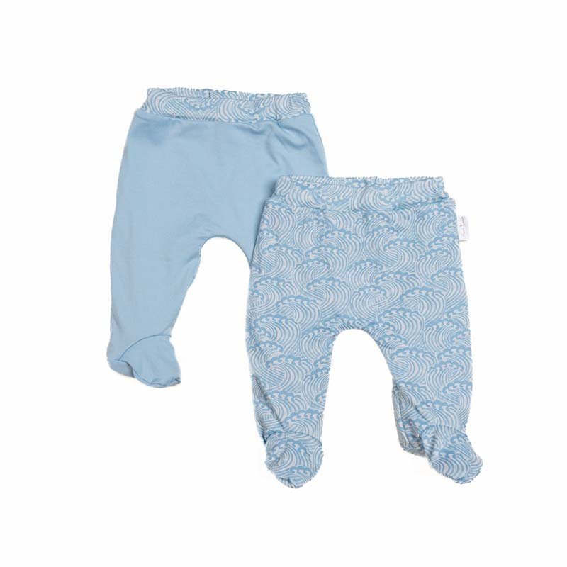 Reversible baby footie pants designed in ultra-soft bamboo organic cotton with the Blue Swells theme.