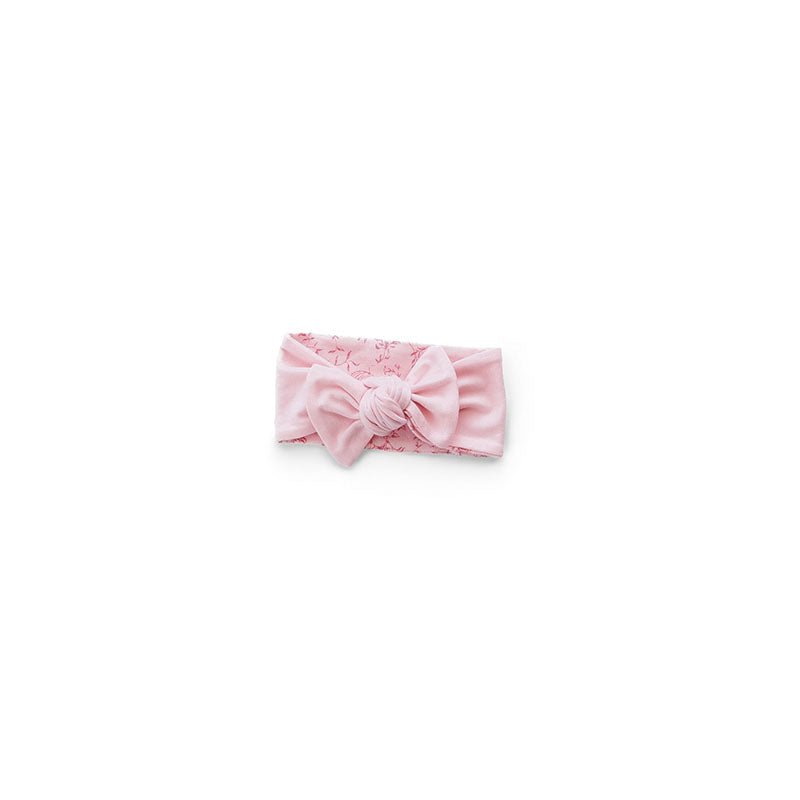 Reversible stylish baby headwrap with bow crafted from ultra-soft bamboo and organic cotton fabric.