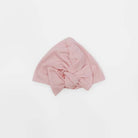 Adorable ruched baby beanie with bows available in luxurious Silky Modal with Bitty Pink Blooms design.