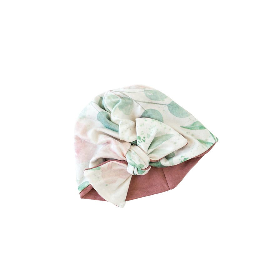 Reversible blushing eucalyptus design baby knotty beanie.