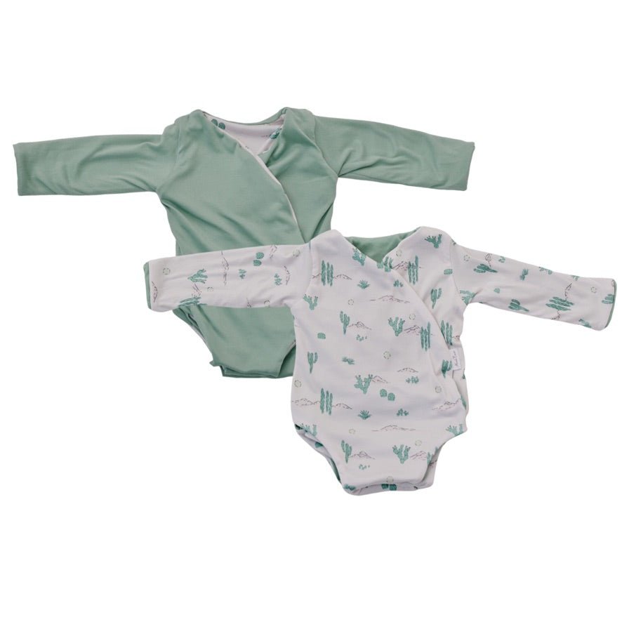 Reversible desert sunsets design long-sleeve baby onesie in classic brushed fabric.