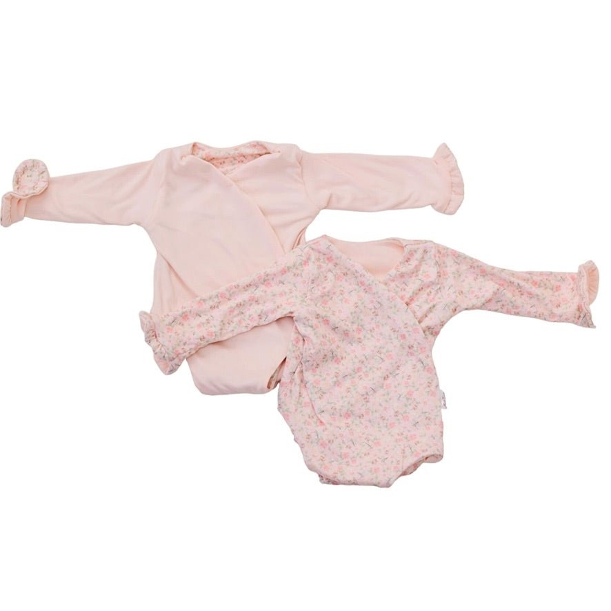 Reversible dusty roses long sleeve ruffle cuff baby onesie.