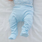 Reversible Blue Swells baby footie pants made with breathable bamboo cotton fabric.