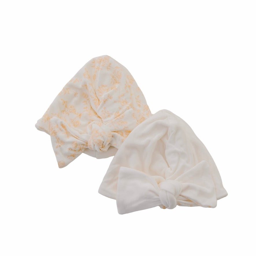 Reversible baby beanie in bitty blooms design.