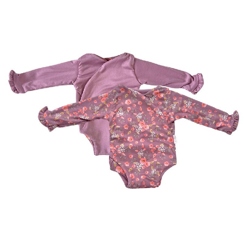 Reversible ruffle cuff baby bodysuit with wings in Peachy Lilac design classic brushed fabric for babies.